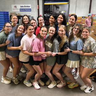 Sisters of Sigma Phi Lambda volunteer with the Brazos Valley Food Bank.